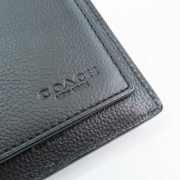 実際に弊社で買取させて頂いたCOACH/コーチ ヴァーシティ ストライプレザー 二つ折り財布 F24649の画像 4枚目