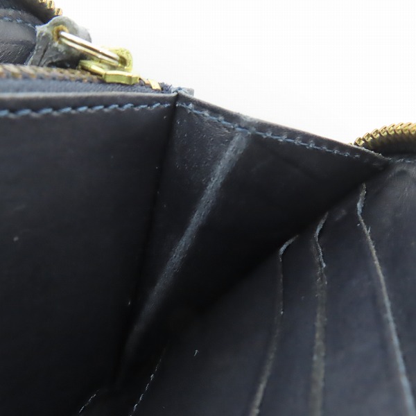 実際に弊社で買取させて頂いたFelisi/フェリージ ラウンドジップ ウォレット クロコ型押し レザー 125の画像 6枚目