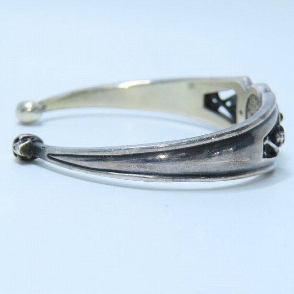 実際に弊社で買取させて頂いたMAGICAL DESIGN/マジカルデザイン チベタン スカル バングル  K18×925の画像 4枚目