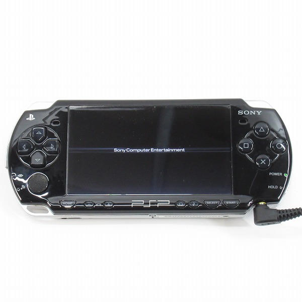 実際に弊社で買取させて頂いたSONY/ソニー PSP/プレイステーションポータブル 本体 PSP-2000 ピアノ・ブラック【難有り/簡易動作確認済】の画像 1枚目